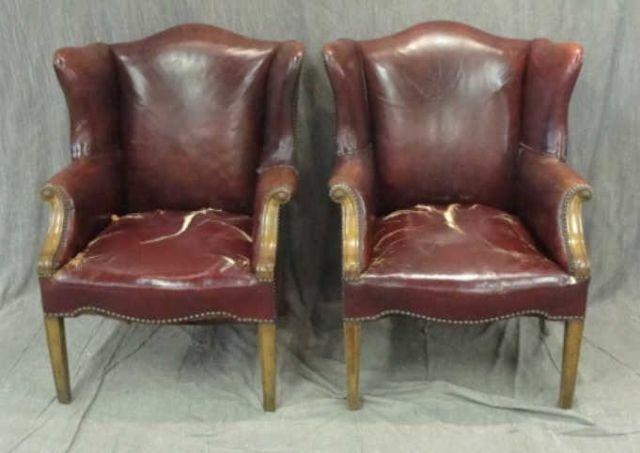 Appraisal: Pair of Leather Wingback Chairs As is Needs reupholstering From