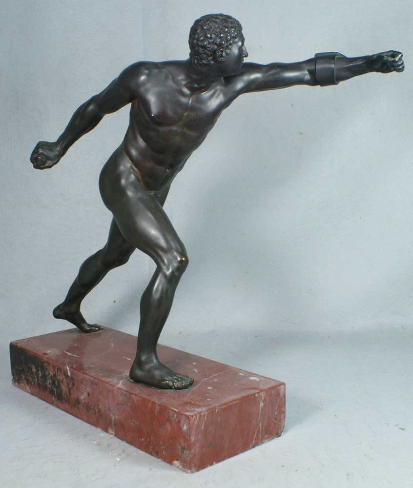 Appraisal: Bronze sculpture of a nude athlete on brown marble base