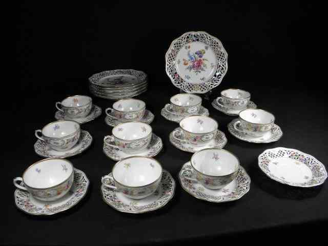 Appraisal: Schumann Bavarian reticulated porcelain partial dessert set Chateau ''Dresden Flowers''