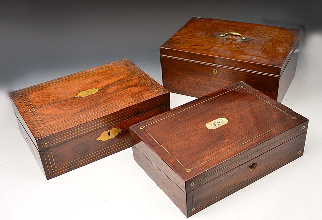 Appraisal: A GEORGE IV ROSEWOOD TABLE DESK with brass inlaid decoration