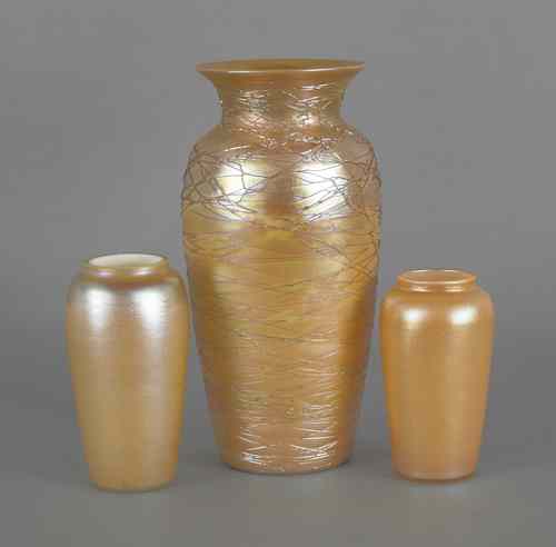 Appraisal: Three gold iridescent art glass vases h h and h