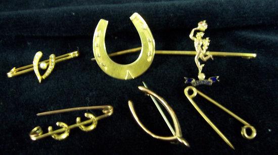 Appraisal: A wishbone brooch a horseshoe brooch and various other brooches