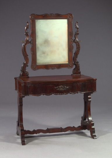 Appraisal: American Rococo Revival Mahogany Dressing Table ca the rectangular mirror