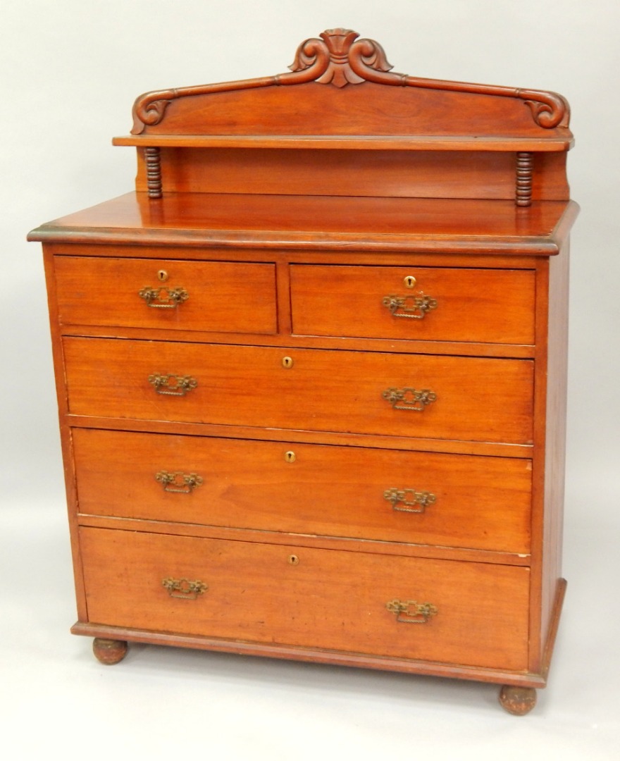 Appraisal: A Victorian mahogany chest of drawers with a galleried back