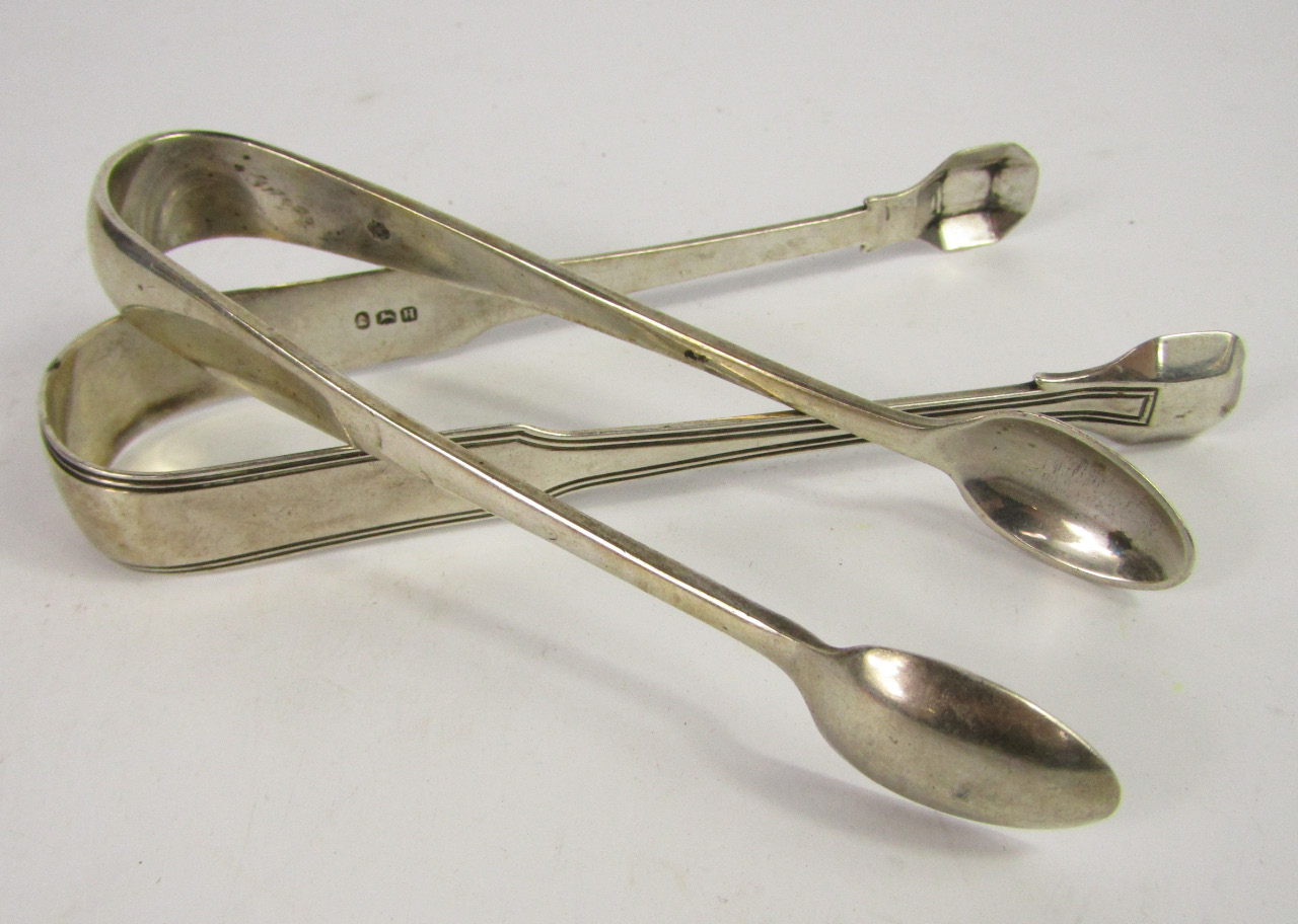 Appraisal: A pair of George III silver sugar tongs London and