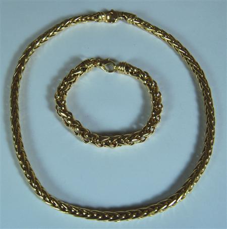 Appraisal: A modern necklace and matching bracelet each of cylindrical section