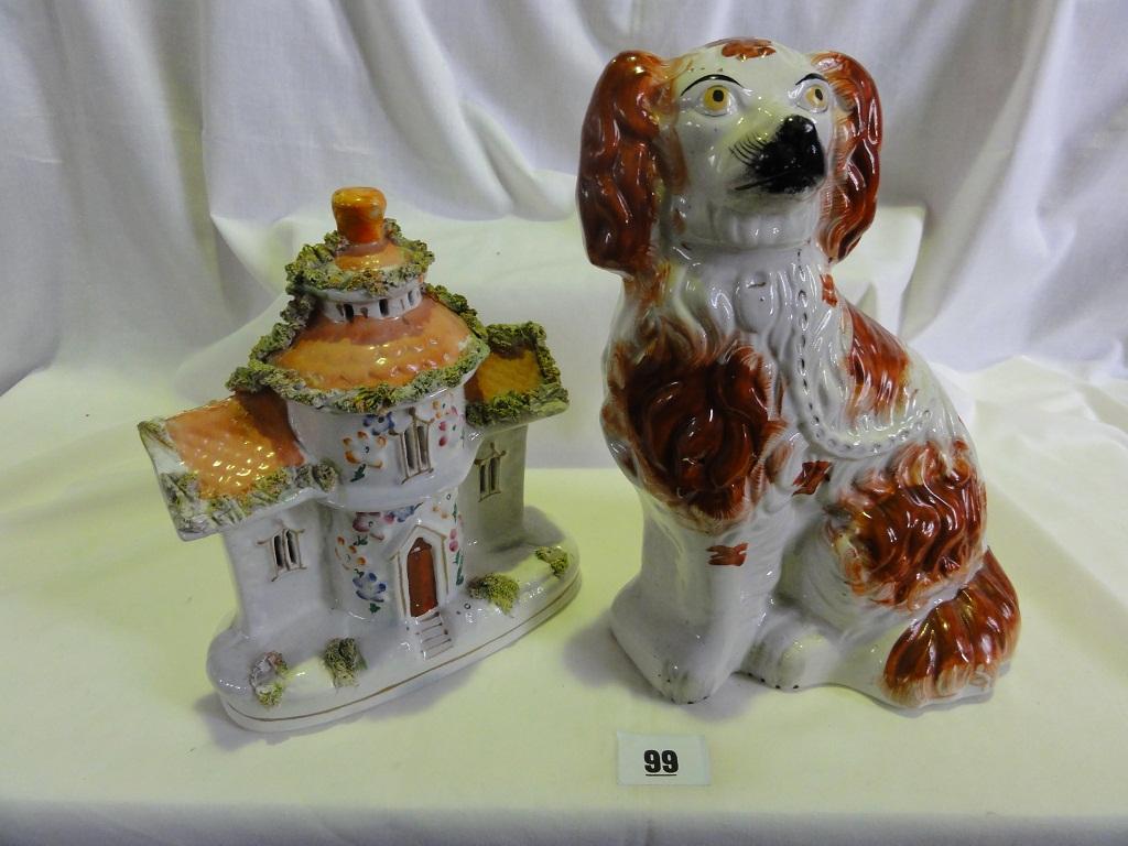 Appraisal: A th century Staffordshire Spaniel with red and white painted