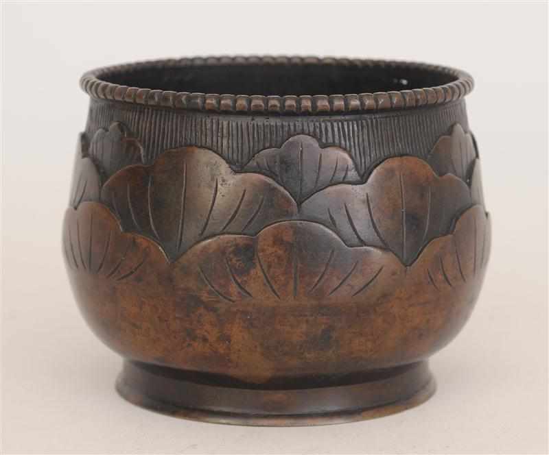 Appraisal: JAPANESE BRONZE FOOTED ''LOTUS'' BOWL Relief banded with tiered leaves