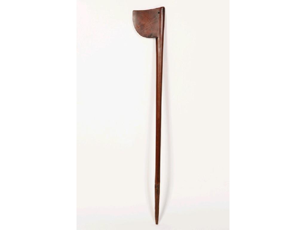 Appraisal: A MAORI TEWHATEWHA BATTLE AXE with a shaped blade on