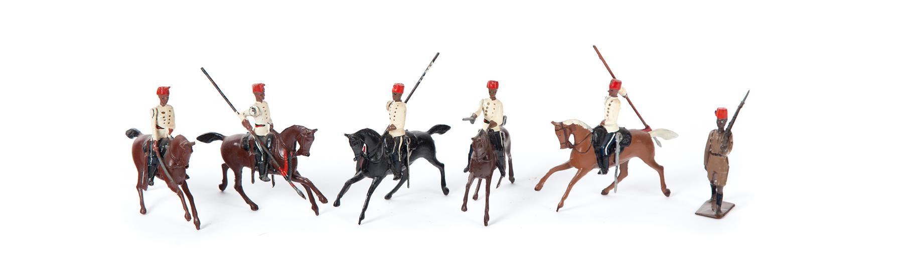 Appraisal: THIRTY-THREE BRITAIN'S SOLDIERS Cast including horse soldiers and a foot