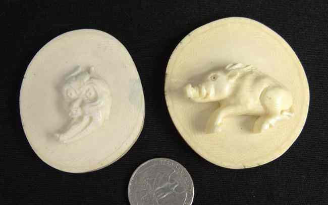 Appraisal: Pair Asian ivory carved discs