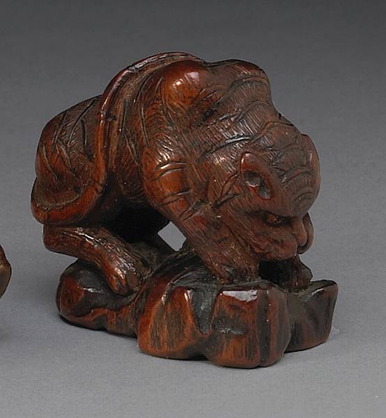 Appraisal: A boxwood study of a tiger th Century The spirited