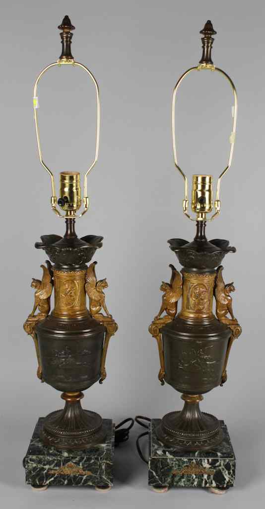 Appraisal: PAIR OF CLASSICAL PATINATED AND GILT METAL TABLE LAMPS with