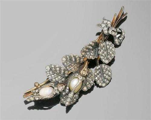 Appraisal: PEARL AND DIAMOND BROOCH ca Silver over red gold Very