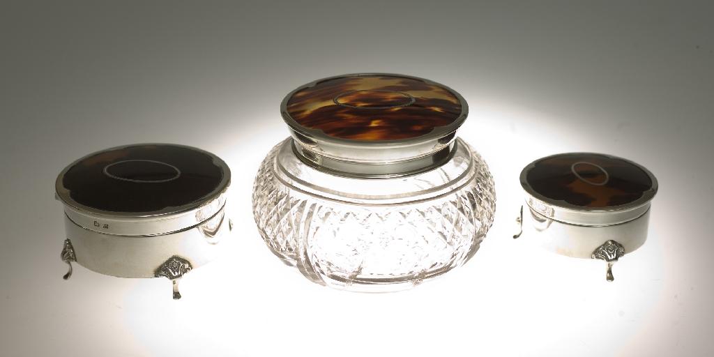 Appraisal: GROUP OF THREE GEORGE V SILVER AND TORTOISESHELL DRESSING TABLE