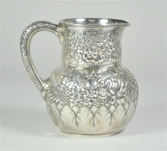 Appraisal: Tiffany Sterling Pitcher pint heavily chased pitcher in a primrose