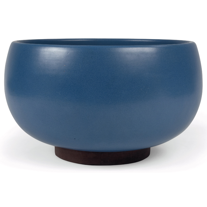 Appraisal: Architectural Pottery planter USA bright blue glaze wood base impressedmark