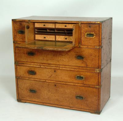 Appraisal: A VICTORIAN OAK SECRETAIRE CAMPAIGN CHEST with fitted secretaire drawer