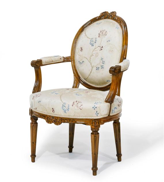 Appraisal: ARMCHAIR EN CABRIOLET Louis XVI molded and carved walnut Beige