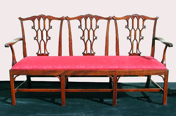 Appraisal: A George III style mahogany settee The triple scrolled crest