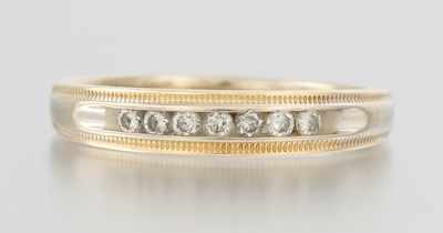 Appraisal: A Gentleman's Two Tone Gold and Diamond Band k white