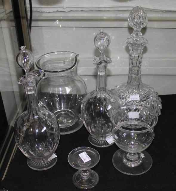 Appraisal: AN ENGLISH GLASS SMALL TAZZA STAND three decanters a glass