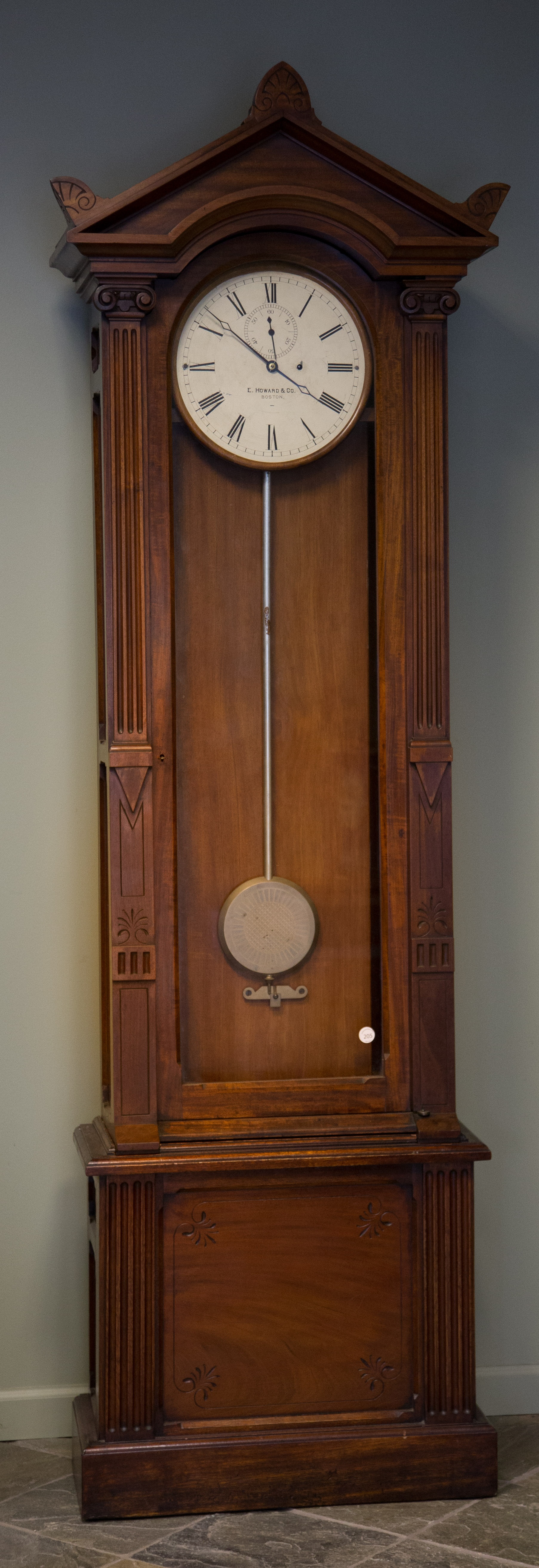 Appraisal: Unusual E Howard Floor Regulator Mahogany case with carved pilasters