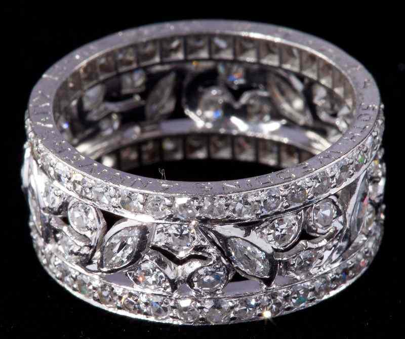 Appraisal: White Gold Diamond Wedding Bandof reticulated and floral design with