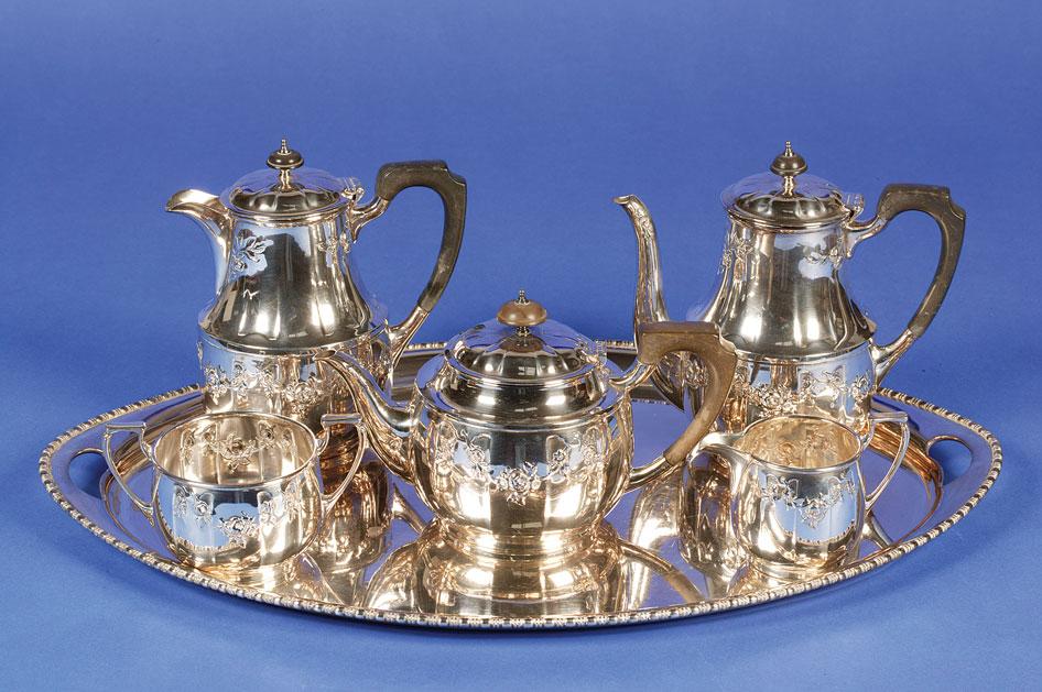 Appraisal: AN ELECTROPLATED FIVE PIECE TEA COFFEE SET of circular panelled