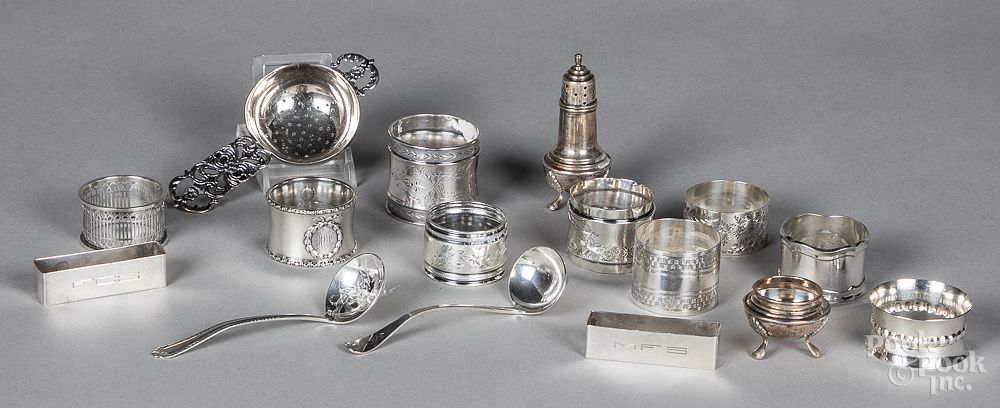 Appraisal: Sterling silver napkin rings etc Sterling silver napkin rings etc