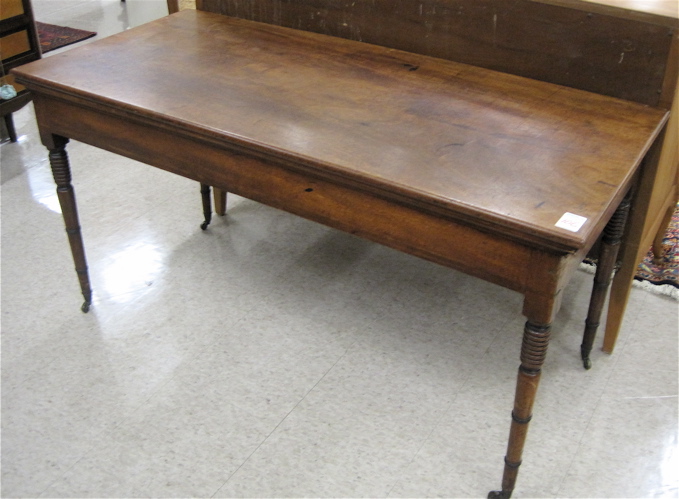 Appraisal: RECTANGULAR WALNUT WORK TABLE American th century the rectangular top