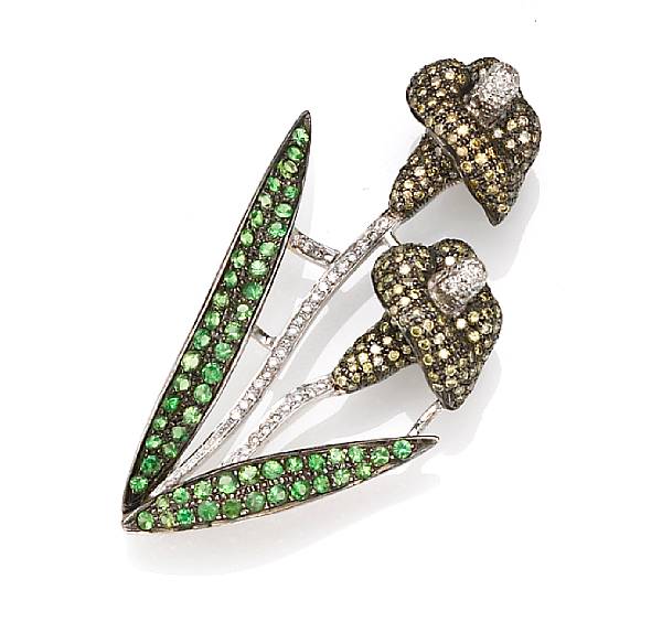 Appraisal: A tsavorite colored diamond and diamond brooch in the form