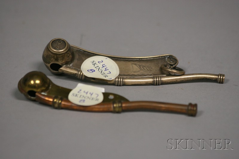 Appraisal: Two Boatswain's Whistles one in silver with engraved decoration and