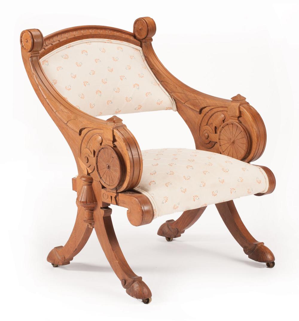 Appraisal: American Renaissance Carved Walnut Armchair late th c foliate-carved canted