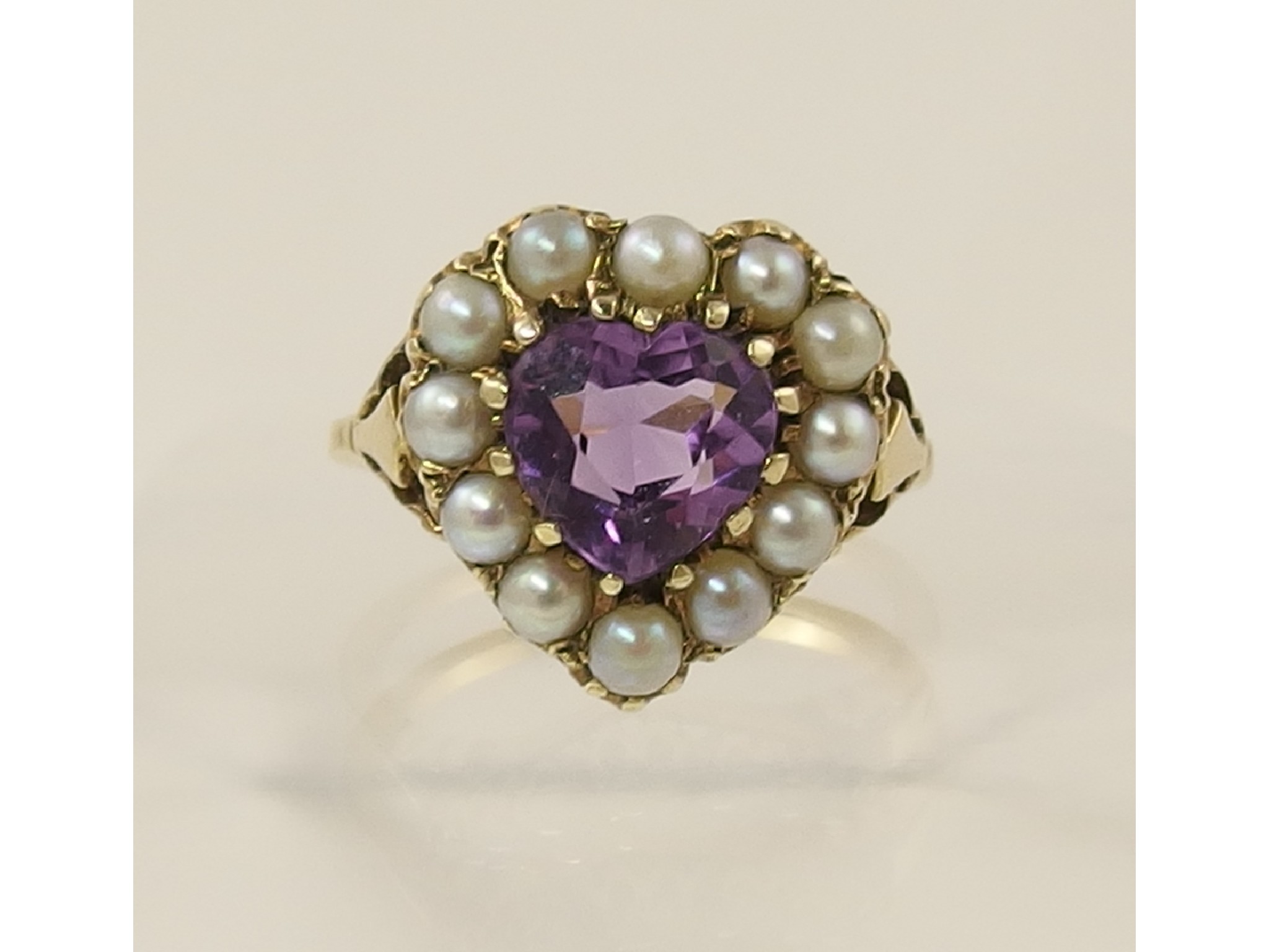 Appraisal: A ct and amethyst heart shaped ring with valuation certificate