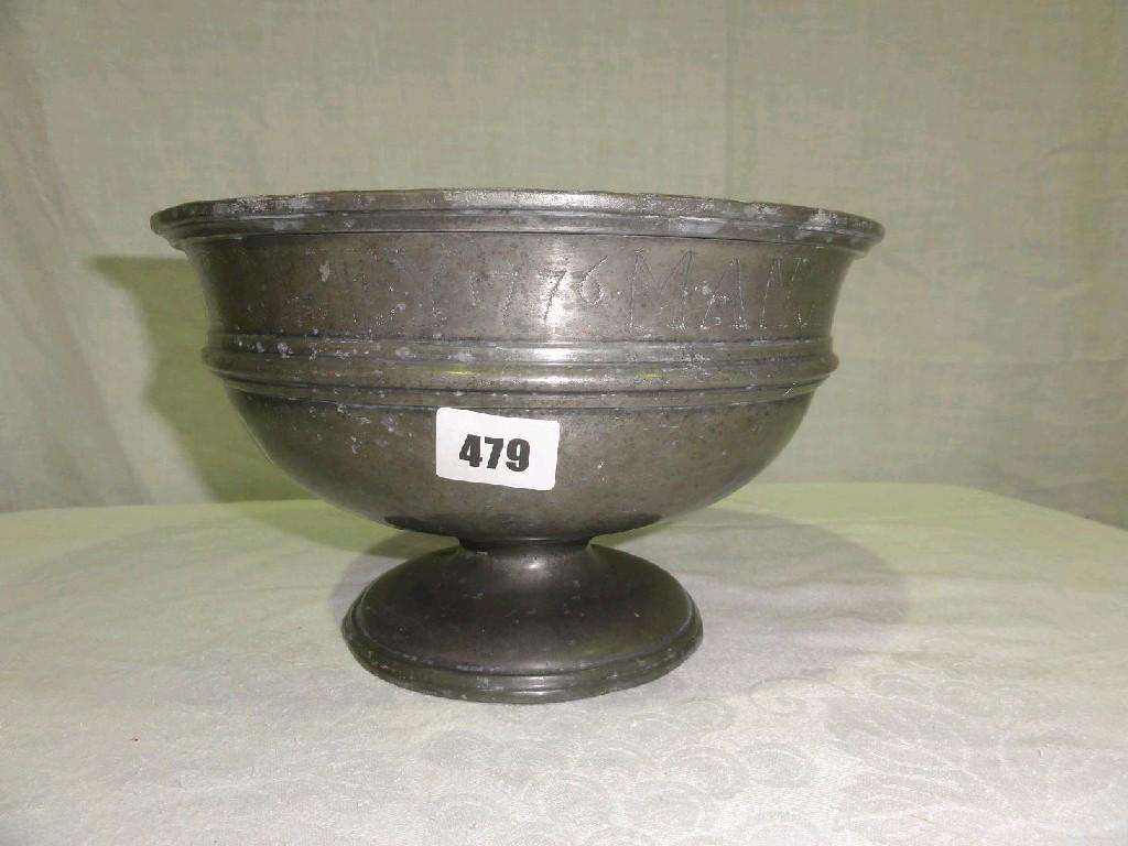 Appraisal: An th century pewter punch bowl raised on a circular