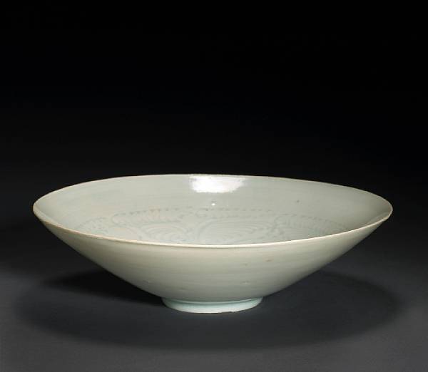 Appraisal: A qingbai glazed porcelain dish with carved decoration Song Dynasty