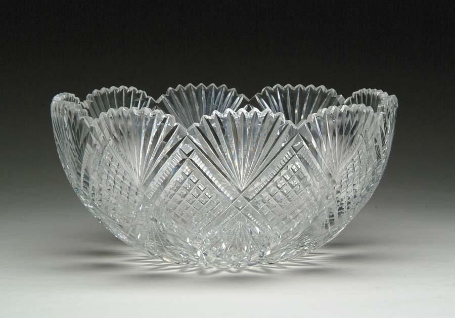 Appraisal: CUT GLASS PUNCHBOWL Punchbowl is cut in strawberry diamond and