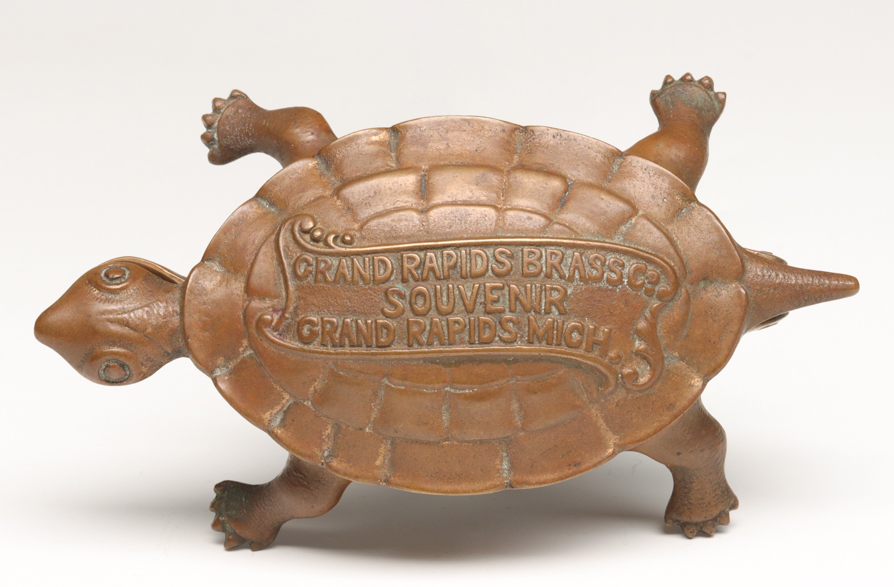 Appraisal: BRASS TURTLE ADVERTISING MATCH SAFE STRIKER C Impressed text on