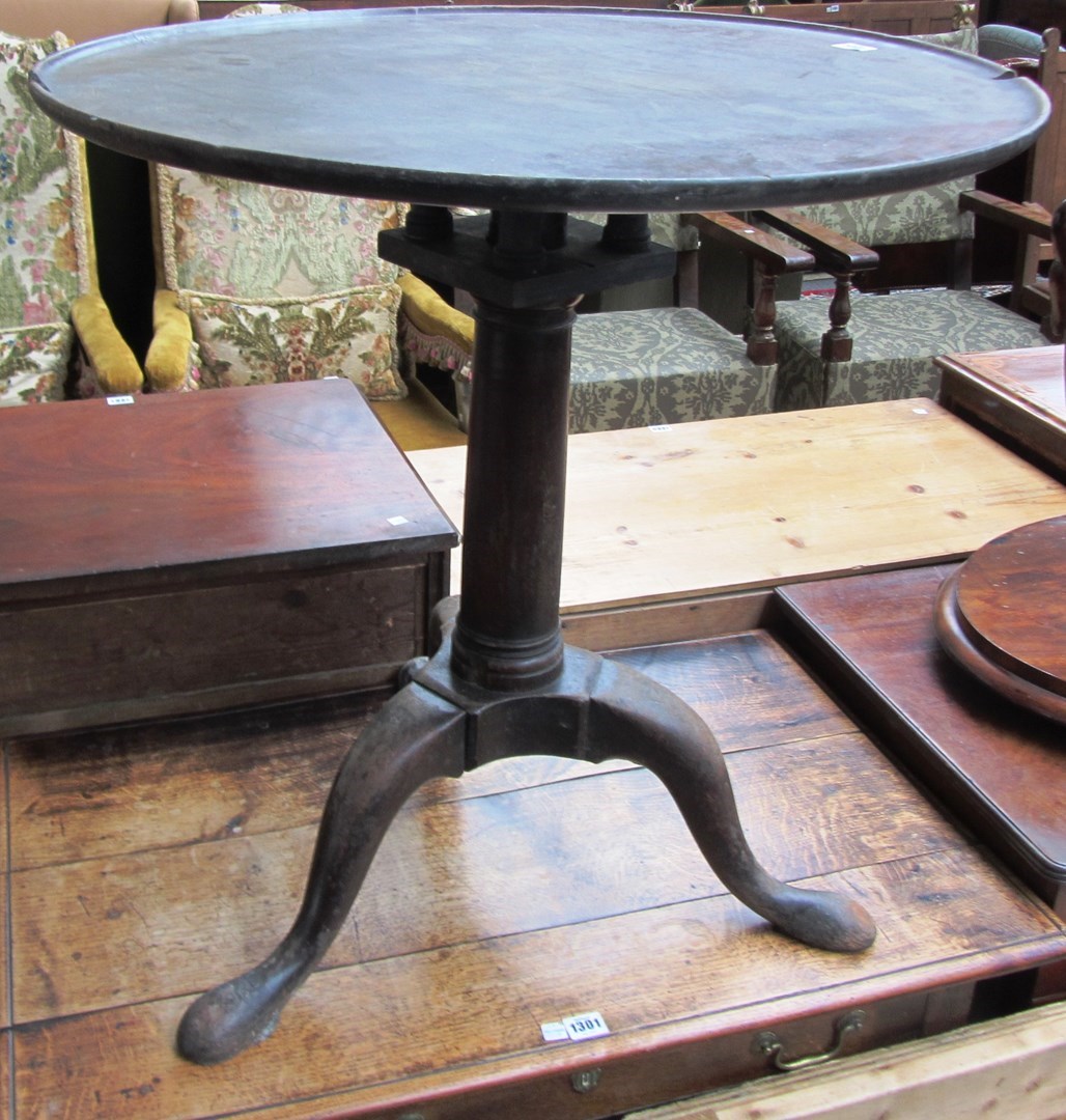 Appraisal: A mid th century mahogany occasional table the dished circular