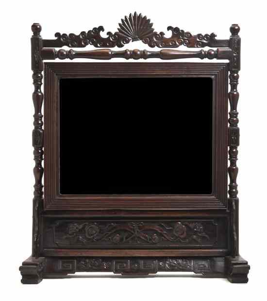 Appraisal: A Chinese Wood Dressing Mirror having a carved fan crest