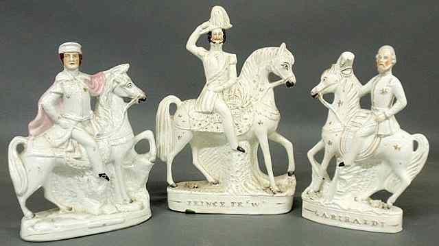 Appraisal: Three th c Staffordshire equestrian figures including Garibaldi Tallest h