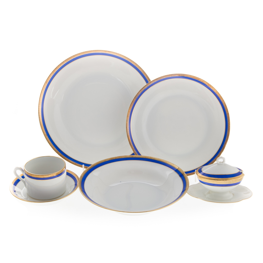 Appraisal: Richard Ginori porcelain dinner service with cobalt and gilt rim