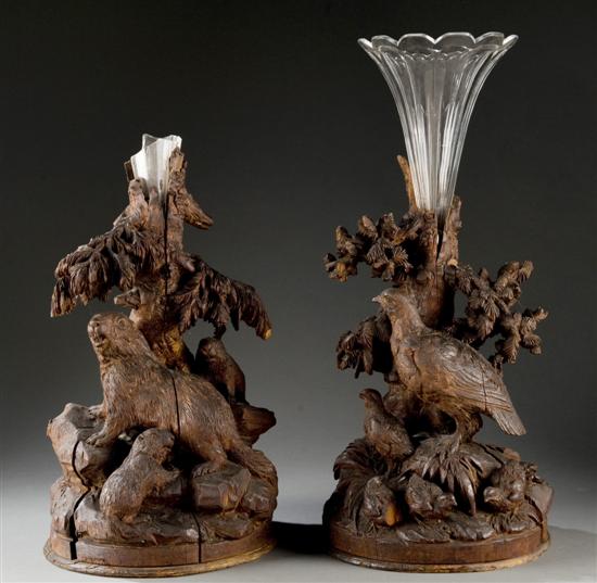 Appraisal: Pair of black forest carved vase holders th century Each