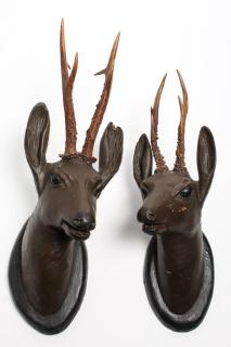 Appraisal: Pair of Black Forest Antler Carved Head Plaques Carved and