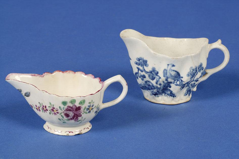 Appraisal: A SMALL POLYCHROME CREAM JUG probably Bow circa the fluted