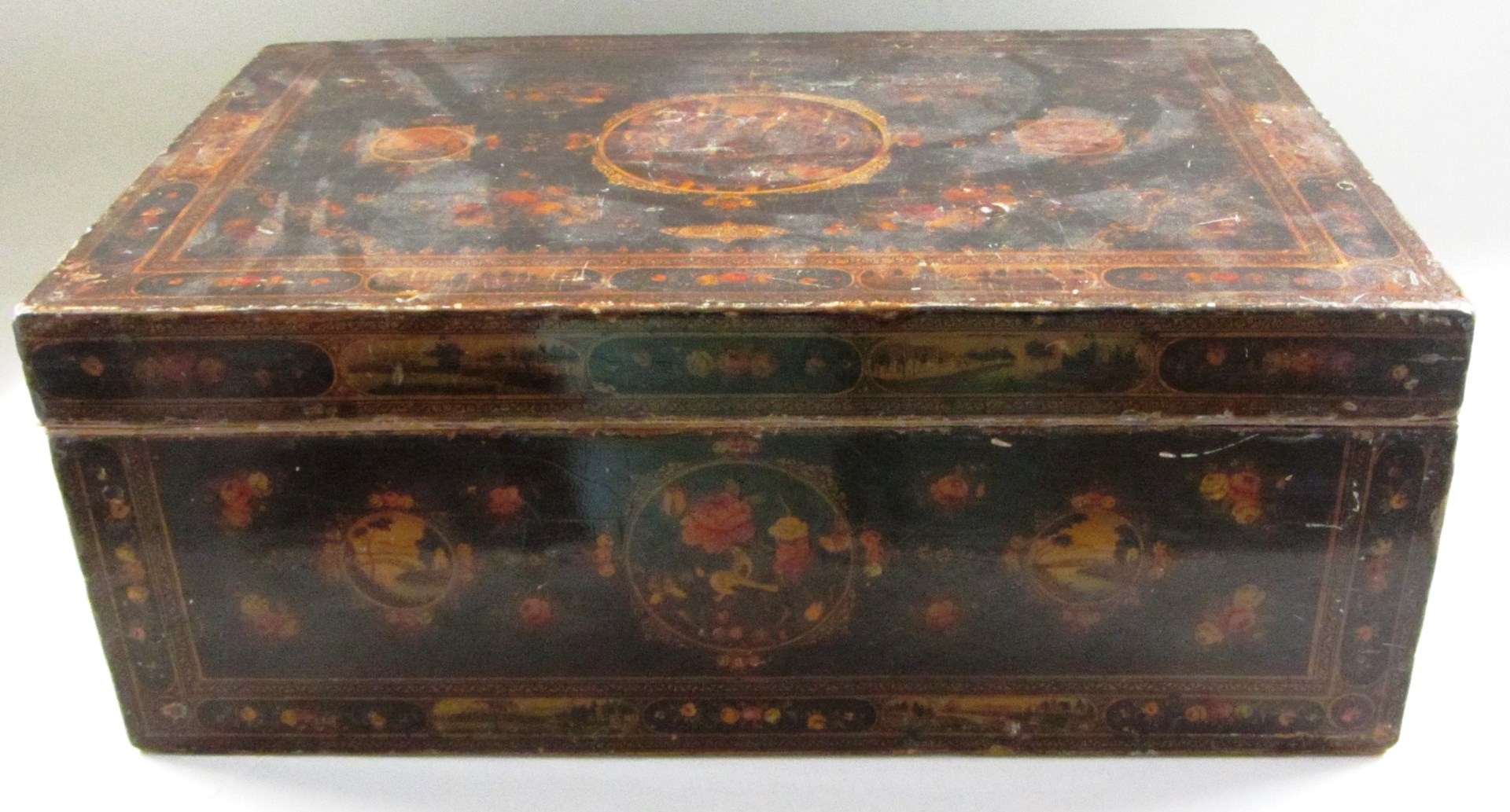 Appraisal: A Qajar lacquered wooden casket signed Mustafa Zadeh 'Abdu Iran