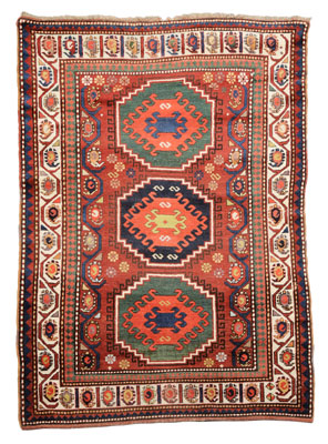 Appraisal: Kazak Rug th century three central medallions on brick-red ground