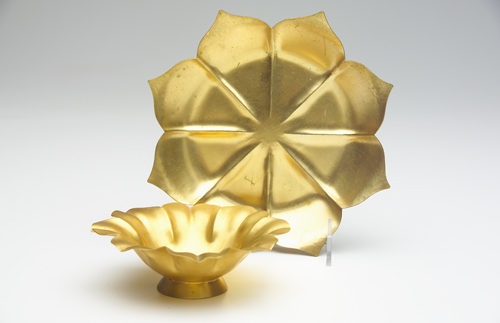 Appraisal: MARIE ZIMMERMANN Two fluted flower-form dishes in gold-plated hammered copper