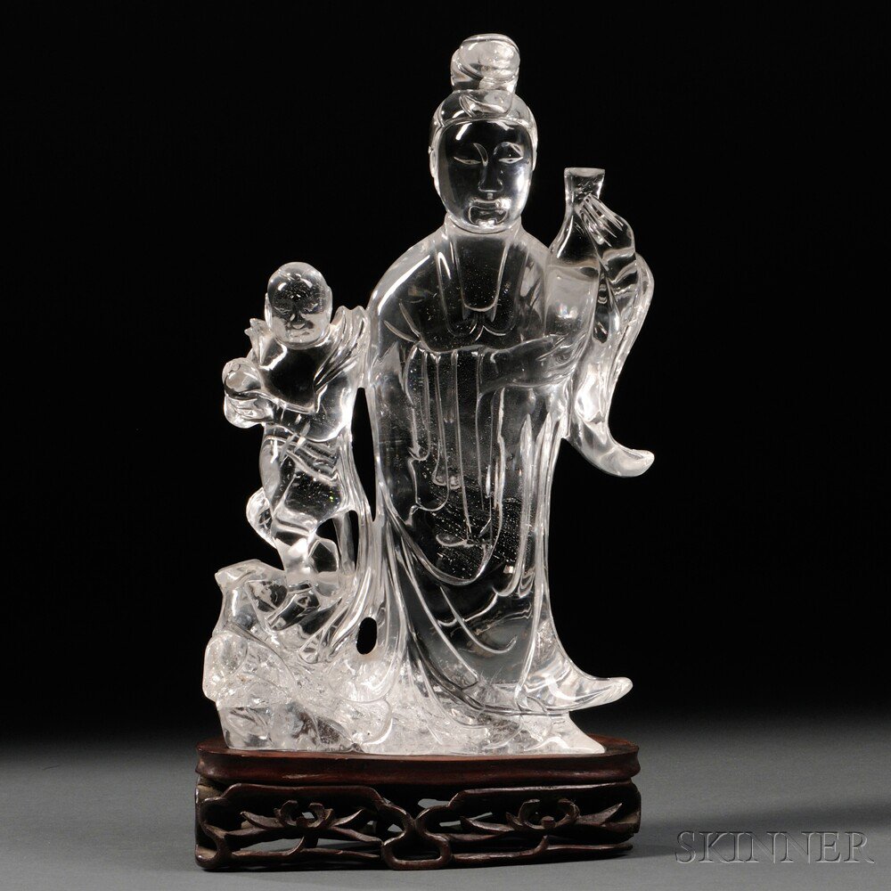 Appraisal: Rock Crystal Carving of Guanyin China th century holding a